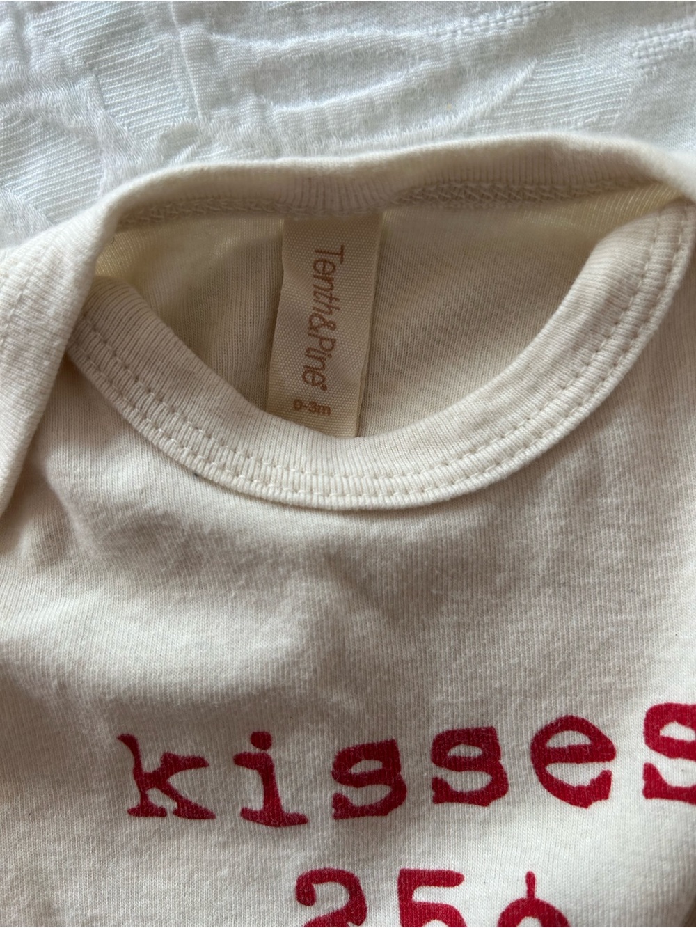 Cream Long-Sleeve Baby One-Piece with Red 'Kisses 25¢' Graphic - Picture 3 of 3